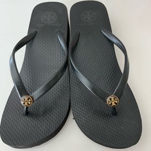 Tory Burch Black Flip Flop Sandals with Gold Logo Accents